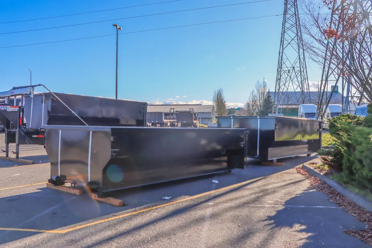 Roll-off dumpster ready for waste disposal at job site for Construction Dumpster Rental in Urbandale